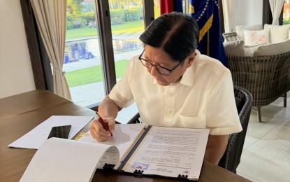 President Ferdinand R. Marcos Jr. on Tuesday (March 24, 2026) signs Executive Order 110 / Photo File PCO